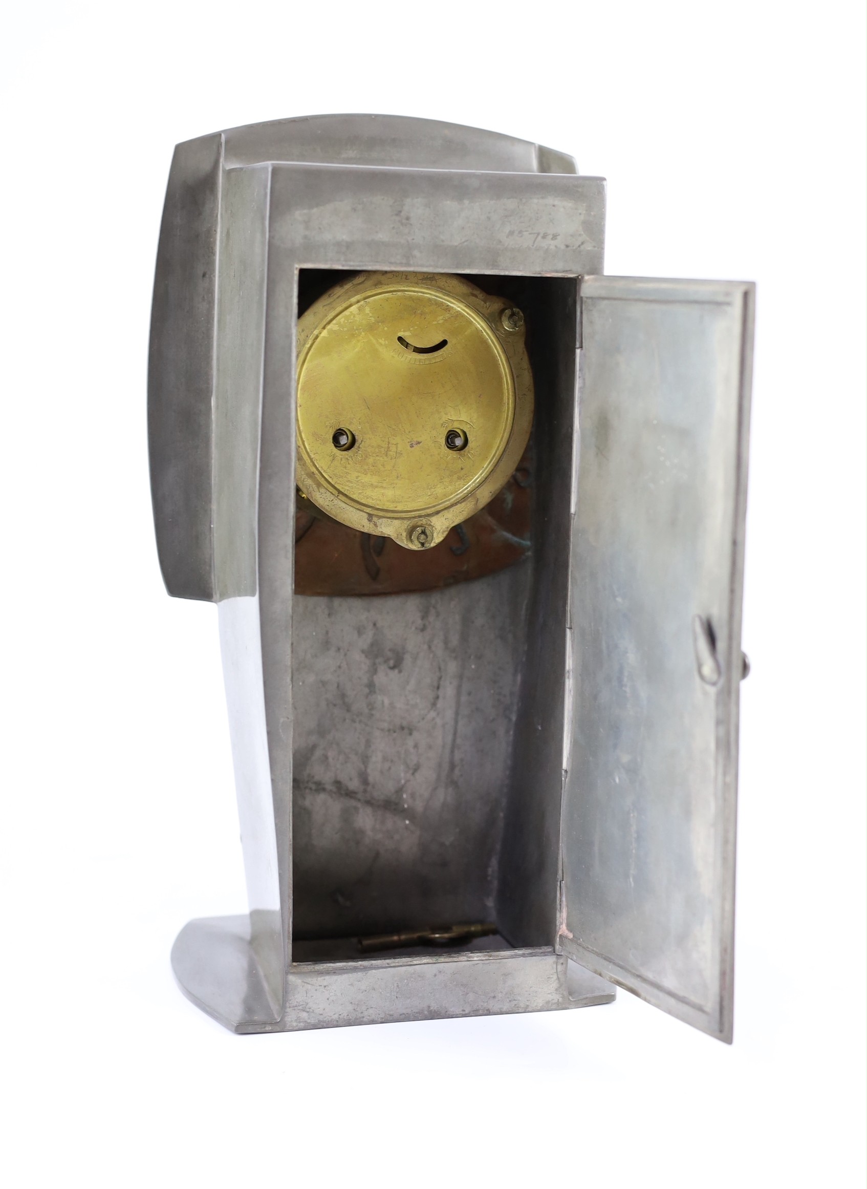Archibald Knox for Liberty & Co., a rare ‘Tudric’ pewter and patinated copper clock, c.1902-05, model no. 0253
